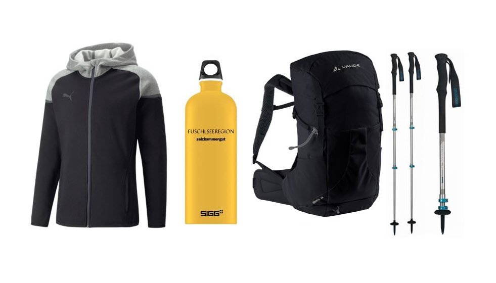Wanderset bestehend aus Rucksack, Stöcken, Wasserflasche und Hoodie Foto: Fuschlseeregion